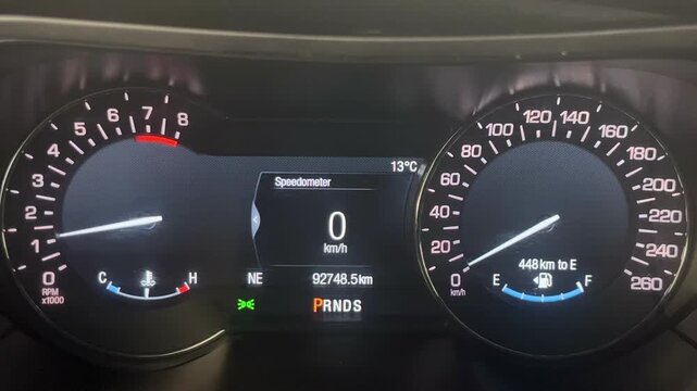 Modern vehicle digital dashboard instrument cluster panel display. Car reeving at 3000 rpm.