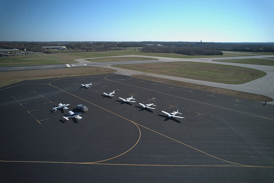 Overhead drone shot of runway and planes at Virginia regional airport