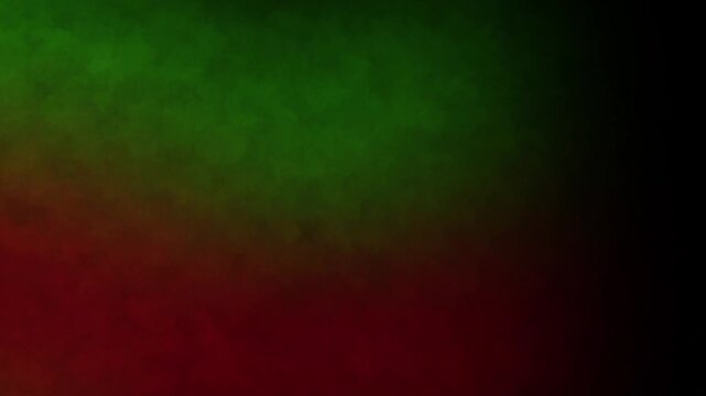 Abstract red and green smoke slow motion background creates a vibrant and dynamic atmospheric effect perfect for various creative visual projects and modern designs.