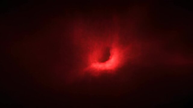 Red black grunge horror creepy abstract dark texture background with eerie red glow shadowed smoke and light burst on dark background with smoky texture dramatic glow