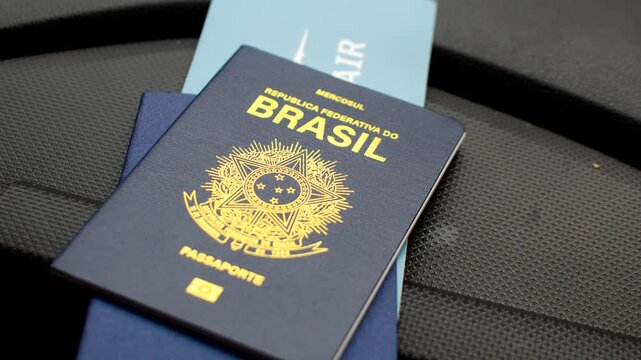 Brazilian passport highlighted on the dashboard, symbolizing travels and adventures. Exploring the world: Brazilian passport featured on the vehicle's dashboard.