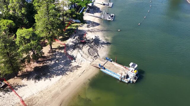 Aerial View of Beach Nourishment Dredging Barge and Excavator in Gold Coast
