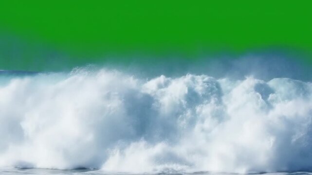 A large wave crashing with a green screen background