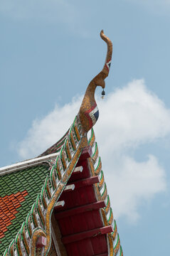 Traditional Thai temple roof architectural detail with Chofah finial