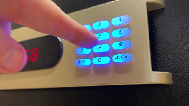 Entering PIN Code on Keypad Secure Access Banking and Security Concept