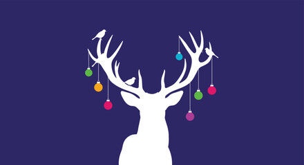 Naklejka premium White silhouette of a deer head against a dark blue background with colorful Christmas ornaments hanging from its antlers.