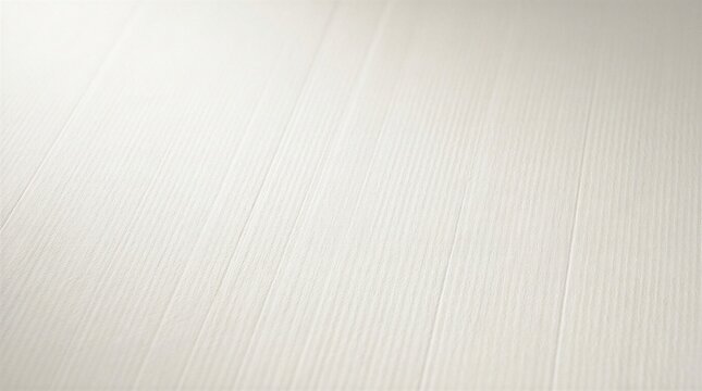 Close-up of a white surface with subtle texture and faint lines running across it giving a sense of depth and detail