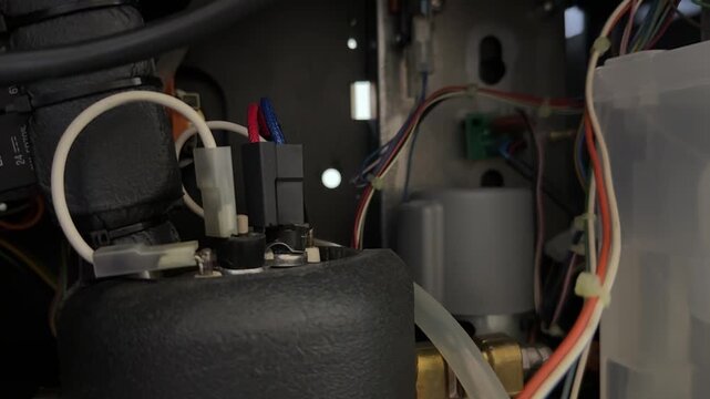 internal compressor and wiring inside coffee vending machine, technical service view of refrigeration system components