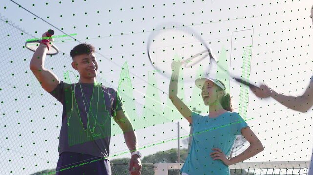 Four teammates tapping rackets then raising rackets at net, signaling end of sports practice