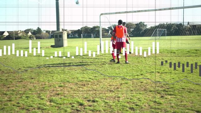 Kicker running up striking free kick with wall team bar wave graphs tracking ball during practice