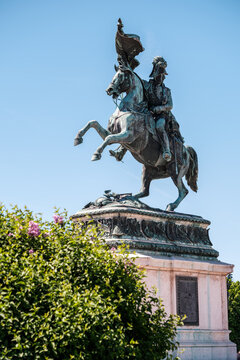 View of the Archduke Charles equestrian statue at Heldenplatz in the Hofburg complex with green bushes and a clear blue sky Vienna, Vienna, Austria.