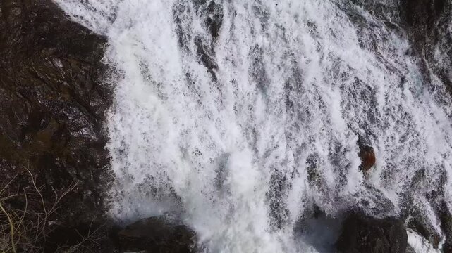 Powerful Waterfalls Of Fervenza das Bra&ntilde;as In Toques, Galicia, Spain. Aerial Tracking Shot