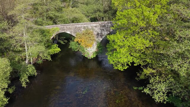 Ponte Medieval de San Alberte Over Rio Parga In Guitiriz, Galicia, Spain. Aerial Descending Shot