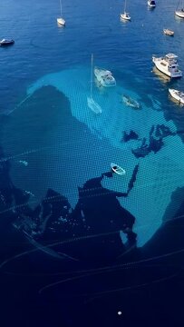 Vertical video: On start teal dotted globe rotating, revealing lands, mapping boats over bay