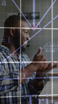 Vertical video: Man shifting from thumbs-up to finger counting with formulas and grid teaching math
