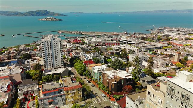 Drone view over San Francisco waterfront neighborhoods and Alcatraz Island