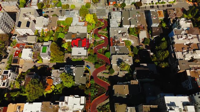 Drone view above winding Lombard Street and residential neighborhood