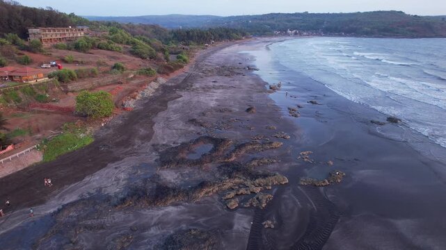 A stunning aerial drone view of Dapoli Beach along the Konkan coastline in Ratnagiri district, Maharashtra, India. 