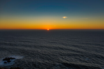 Sunset Over the Atlantic Ocean: The Sun Dipping Below the Horizon © Catalin