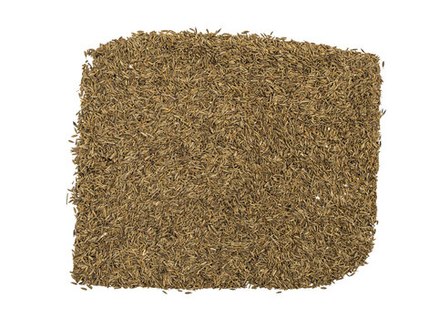 Top view of a pile of dried cumin seeds on Transparent paper background, textured spice heap for cooking and seasoning concepts.