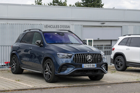 Laxou, France - May 7th 2026 : View on a blue Mercedes-AMG GLE 53 Hybrid 4MATIC+ finished in Sodalith Blue parked on a street.