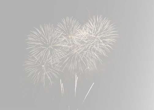 Abstract luxury golden fireworks composition with glowing festive sparkles and radiant particle bursts on elegant dark celebration background overlay