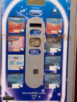 Durex condom vending machine in Fiorenzuola d'Arda, offering various protection products for purchase