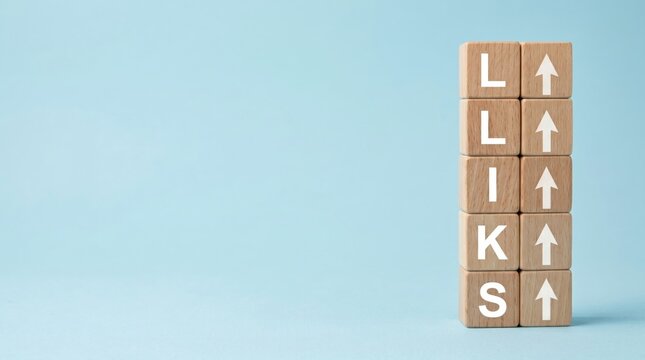 Wooden blocks stacked vertically spelling LINKS with upward arrows, symbolizing backlink building, SEO strategy, website traffic growth and digital marketing connection
