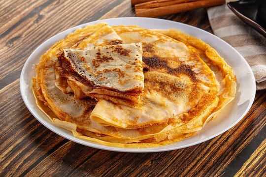 Thin homemade golden pancaces stack