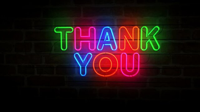 Thank you neon symbol on brick wall. Gratitude light color bulbs abstract concept.