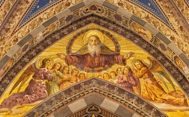 Obraz premium BERGAMO, ITALY - MARCH 18, 2026: The neo gothic freesco of God the Creatro among the angels in the church Oratorio dell Immacolata by unknown artis from beginn of 20. cent.