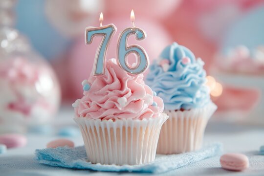 Elegant pink and blue birthday cupcakes with candles for 76th celebration