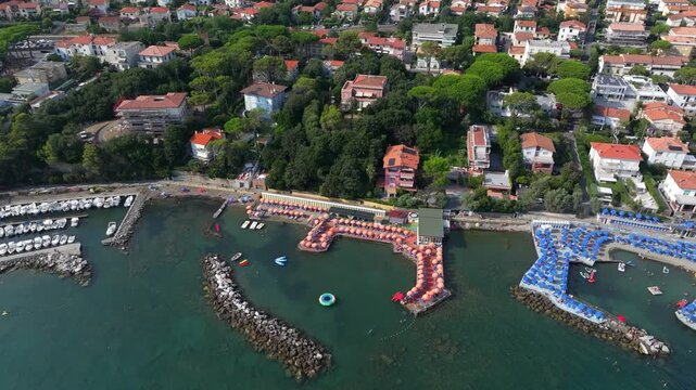 European elegance, private beach clubs, drinks, meals and socializing in the warm Tuscan sun in Castiglioncello, Italy
