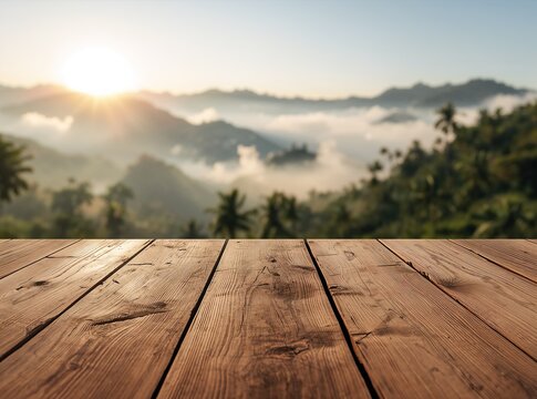 Empty rustic wooden table with a blurred mountain sunrise landscape. Tropical morning with fog and palm trees background mockup.