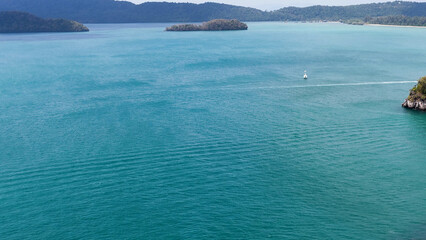 Aerial View of Turquoise Ocean and Distant Islands in Krabi Thailand © blueringmedia