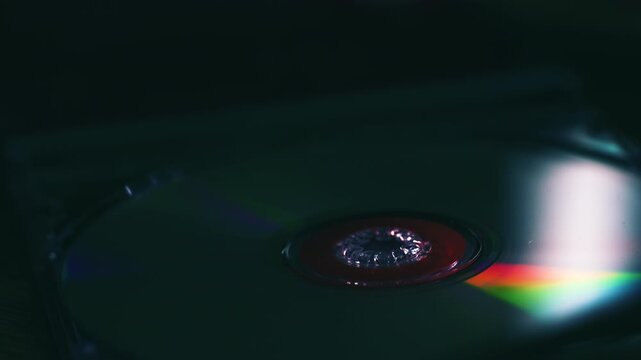 Light shining off the surface of a CD disk