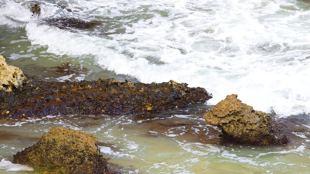 White Ocean Waves Crashing Over Rugged Rocks at Loch Ard Gorge