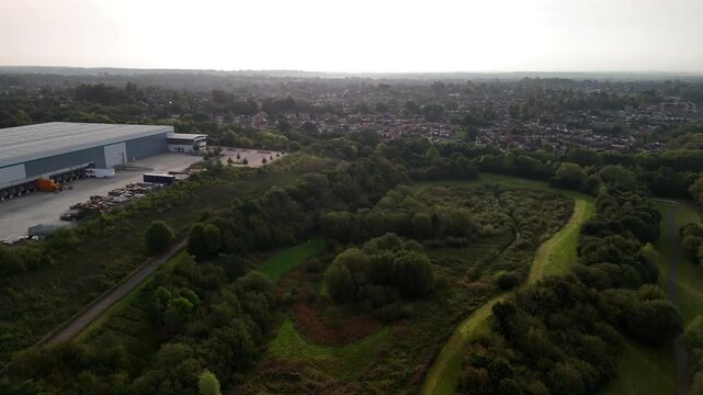 Aerial View of Industrial Estate and Suburban Town on Horizon in Northamptonshire England