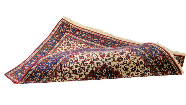 Isolated traditional ornate oriental rug with intricate floral pattern in blue and red tones, rolled up