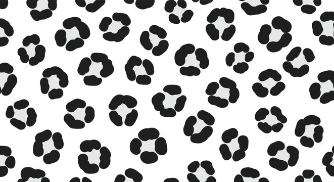 Seamless animal print background featuring a classic black and white leopard or cheetah spot pattern on a clean white surface.