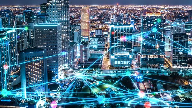 Smart city night sky line digital network connection. Digital plexus network connection overlay on a city at night 