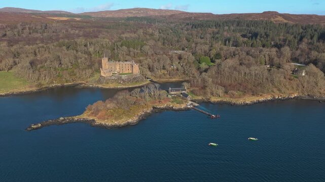 Scenic aerial footage of the historic dunvegan castle, the ancestral home of the clan macleod, situated on the shores of loch dunvegan