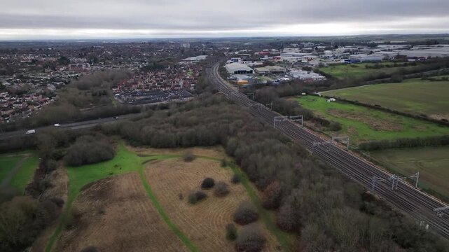 Aerial Drone View of Suburban Town and Motorway Junction in Kettering Northamptonshire England