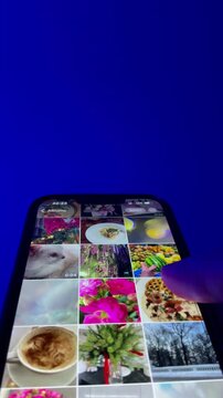 Hand scrolling smartphone footage. Hand scrolling smartphone video. Hand scrolling smartphone background