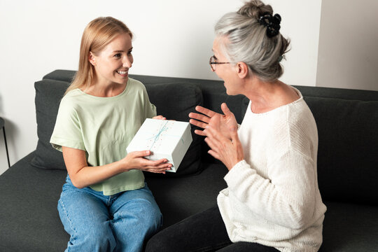 Adult daughter surprises senior mother with a special present