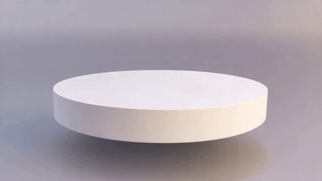 Minimalist 3D animation of a floating white circular pedestal slowly descending onto a light-colored surface.