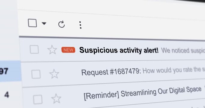 Incoming email with title Suspicious activity alert, new email with notice about unusual bank account activity, close up footage