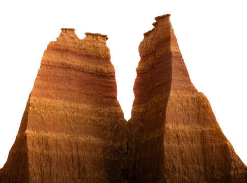 Isolated weathered red rock hoodoos with unique erosion patterns, natural land formation