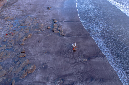 A stunning aerial drone view of Dapoli Beach along the Konkan coastline in Ratnagiri district, Maharashtra, India.