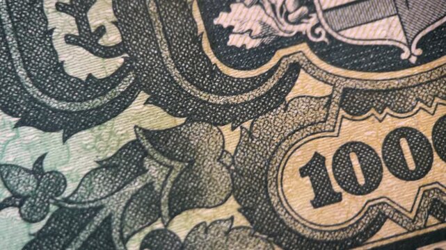 Closeup of a 1000 denomination banknote design with intricate patterns and details. Suitable for finance, money, currency, and banking concepts.